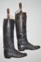 Lot 400 - A pair of black leather riding boots, with...