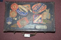 Lot 412 - An early 20th Century suitcase covered in...