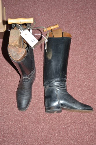 Lot 415 - A pair of lady's black riding boots with trees,...