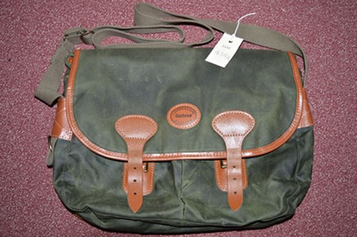 Lot 438 - Tackle bag in green waxed canvas and leather...