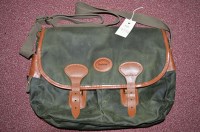 Lot 438A - Tackle bag in green waxed canvas and leather...