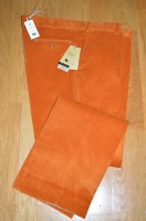Lot 445 - A pair of burnt orange coloured corduroy...