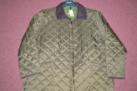 Lot 454 - A dark green Barbour quilted nylon jacket with...