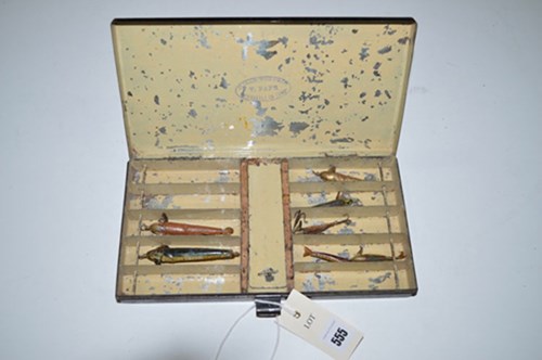 Lot 555 - A black japanned tin lure box, 10 x 5 1/2in.,...