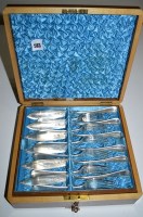 Lot 583 - A set of twelve fish knives and matching forks,...