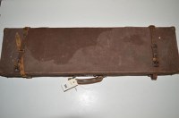 Lot 594 - A canvas on wood gun case for a double...