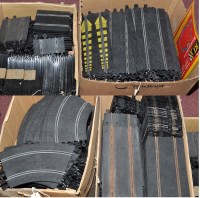 Lot 1097 - A large quantity of Scalextric track in four...