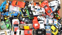 Lot 1104 - A quantity of slot cars by Scalextric and...