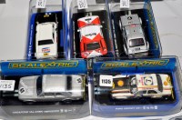 Lot 1135 - Five Scalextric slot cars to include a Ford...