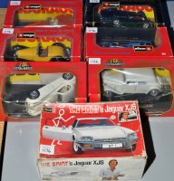 Lot 1176 - Die-cast model vehicles by Burago, to include...