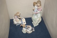 Lot 309 - Three Lladro groups, to include: a mother and...