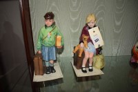 Lot 331 - Royal Doulton figures: ''The Boy Evacuee'' and...