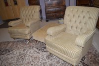 Lot 757 - A pair of large modern armchairs with buttoned...