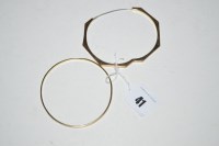 Lot 41 - A 9ct. yellow gold octagonal bangle, 4.8grms;...