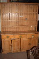 Lot 739 - A 19th Century pine dresser, the slat back...