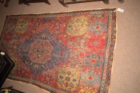 Lot 382 - A Heriz rug with geometric designs overall...