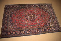 Lot 399 - A Kerman rug, decorated throughout with...