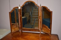 Lot 694 - A triptych dressing table mirror with brass...