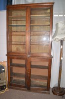 Lot 1811 - A late 19th Century oak display cabinet,...