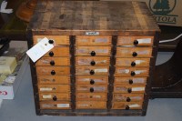 Lot 14 - A watchmakers cabinet containing a selection...