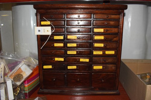 Lot 41 - A watchmakers cabinet, containing various...