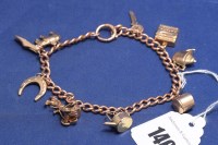 Lot 146 - A 9ct yellow gold curb link charm bracelet...