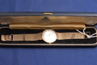 Lot 164 - A Mappin 9ct. yellow gold cased wristwatch,...