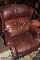 Lot 765 - A pair of brown leather reclining armchairs by...