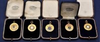 Lot 286 - Five 9ct. yellow gold and enamel medals for...