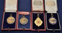 Lot 288 - Four 9ct. yellow gold and enamel medals,...
