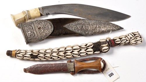 Lot 335 - A 19th Century Indian kukri, the curved 30cms...