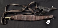 Lot 354 - Two 19th Century brown leather shot pouches,...