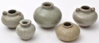 Lot 518 - Five Chinese Celadon jars, two with ring...