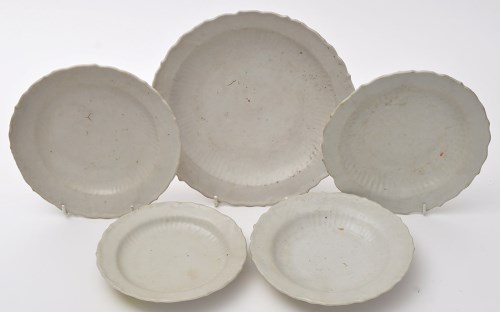 Lot 521 - Five Chinese white glaze lobed rim dishes,...
