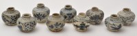 Lot 530 - Nine Chinese blue and white jars, with flowers...