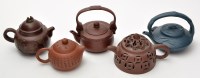 Lot 570 - Five Chinese Yixing teapots and covers,...