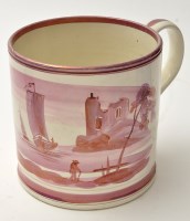 Lot 630 - Large creamware lustre mug of 'North East'...