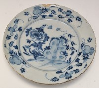 Lot 646 - Blue and white delftware dish, central recess...