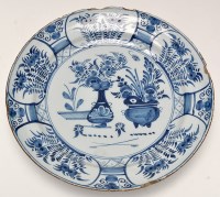 Lot 650 - Blue and white delftware dish, the central...