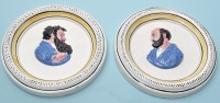 Lot 668 - Pair of Prattware circular wall plaques, with...