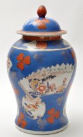 Lot 677 - Imari style inverted baluster vase and cover,...