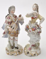 Lot 684 - Pair of Meissen style figures of musician and...