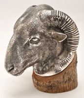 Lot 690 - An EPNS model of a rams head, on wooden stand,...