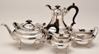 Lot 696 - A George V silver four-piece tea service, by...