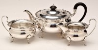 Lot 697 - A George V silver three-piece tea service, by...