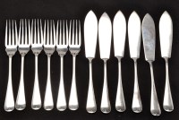 Lot 707 - Six George V silver fish knives and matching...