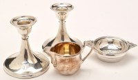 Lot 709 - A pair of George V silver dwarf candlesticks,...