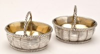 Lot 730 - A pair of George III silver double table salts,...