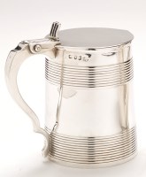 Lot 742 - A George III silver lidded tankard, probably...