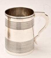 Lot 745 - A George III silver mug, probably by William...